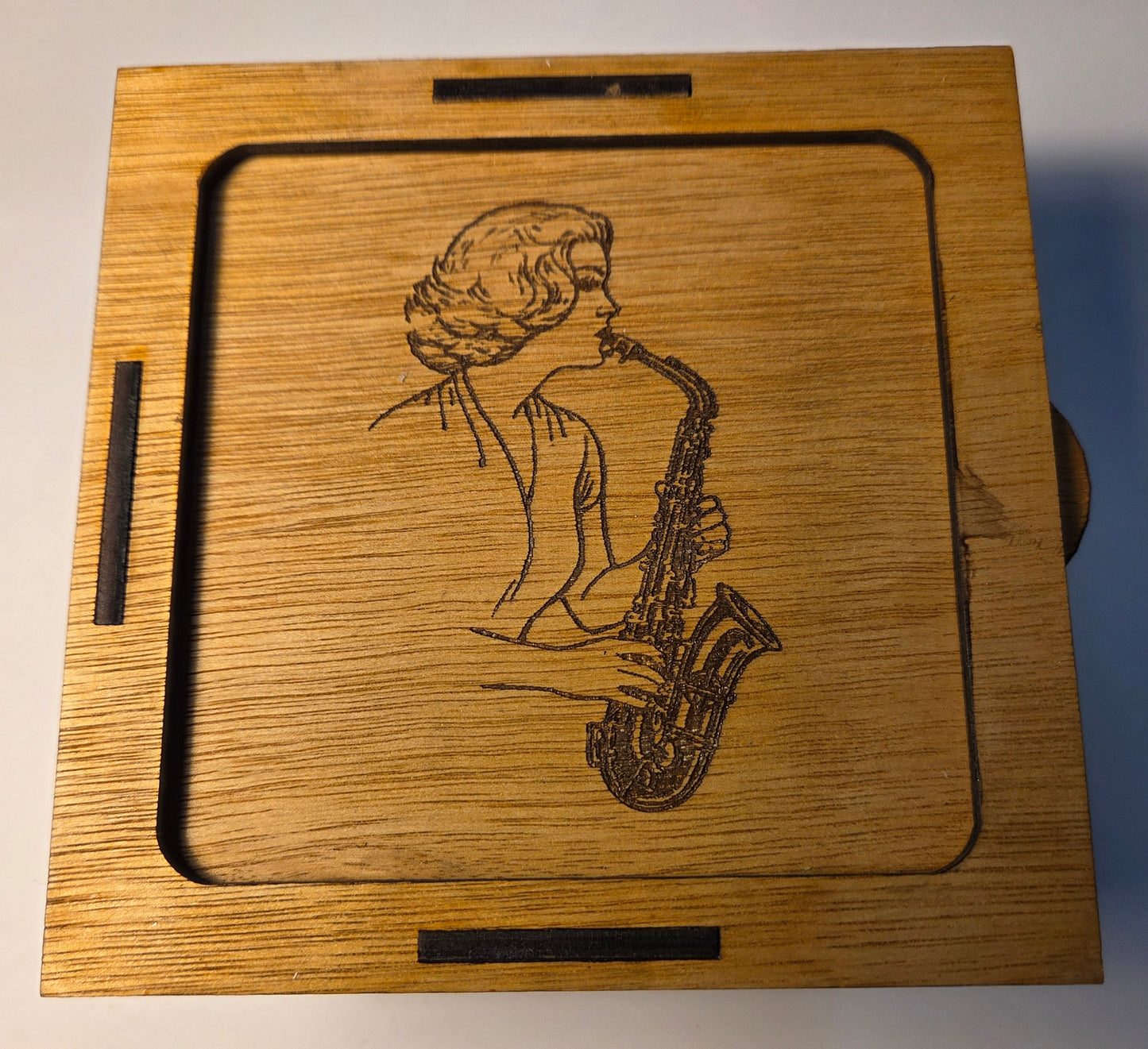 Wooden Box (125 x 125 x 55mm) with Saxophone Player
